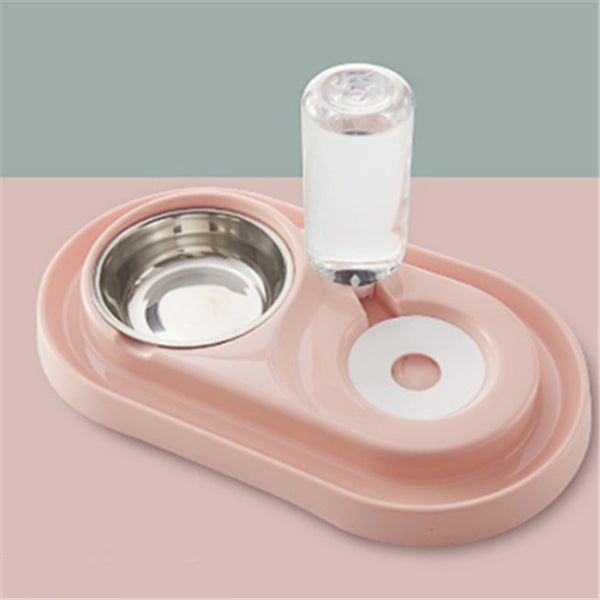 Pink pet feeder with a water bottle on a pink and gray background