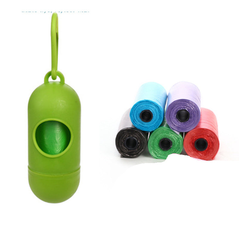 Green plastic container with a hanging loop and colorful rolls of waste bags