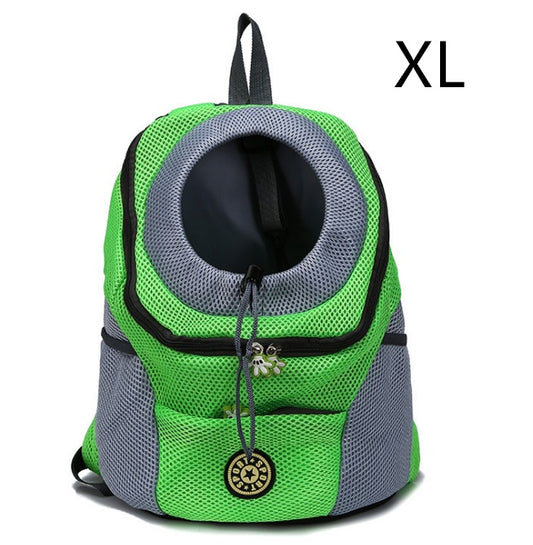 Green and gray pet carrier backpack with 'XL' label on a white background
