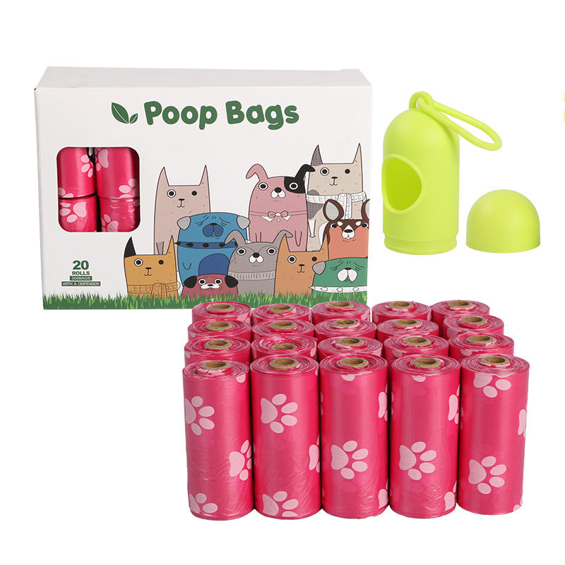 Dog poop bags with a packaging box featuring cartoon dogs and a green waste bag holder on a white background.