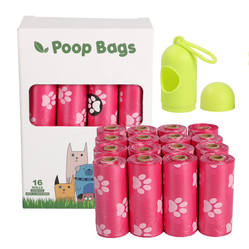 Pink dog poop bags with a green bag holder on a white background