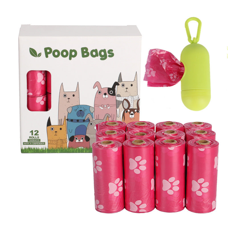 Dog poop bags with packaging and a green bag holder on a white background