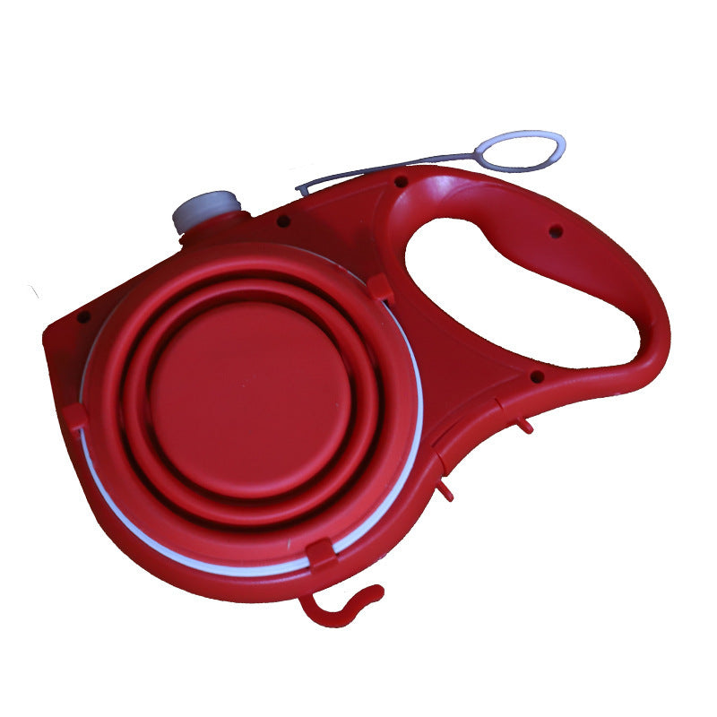 Red retractable dog leash on a white background