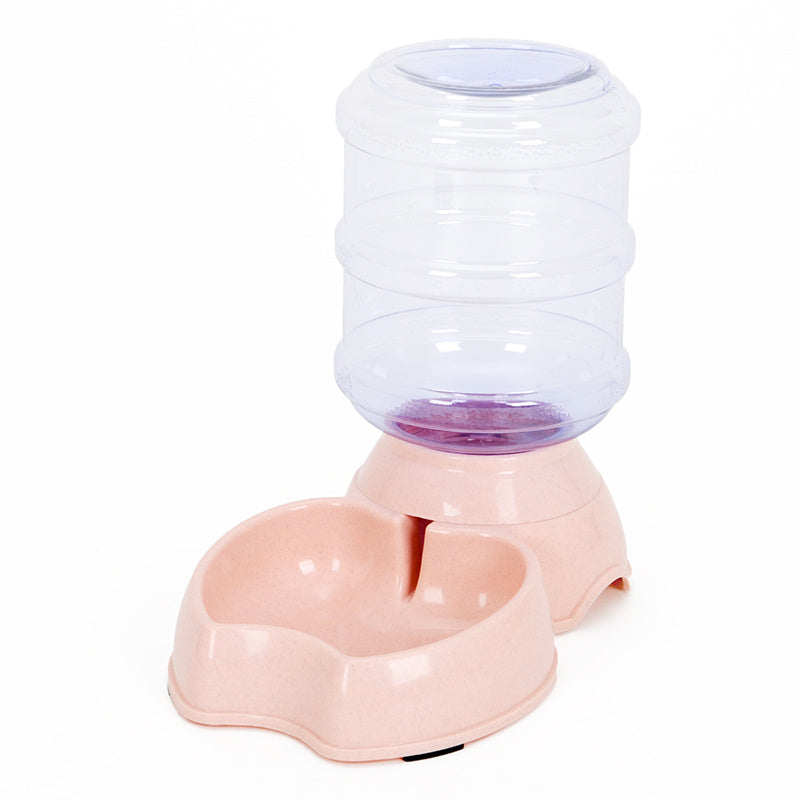 Pink pet water bottle with a clear container on a white background