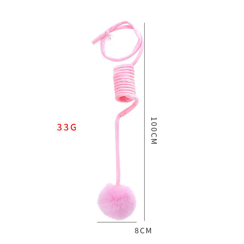 Pink spring with a ball at the end, showing measurements on a white background