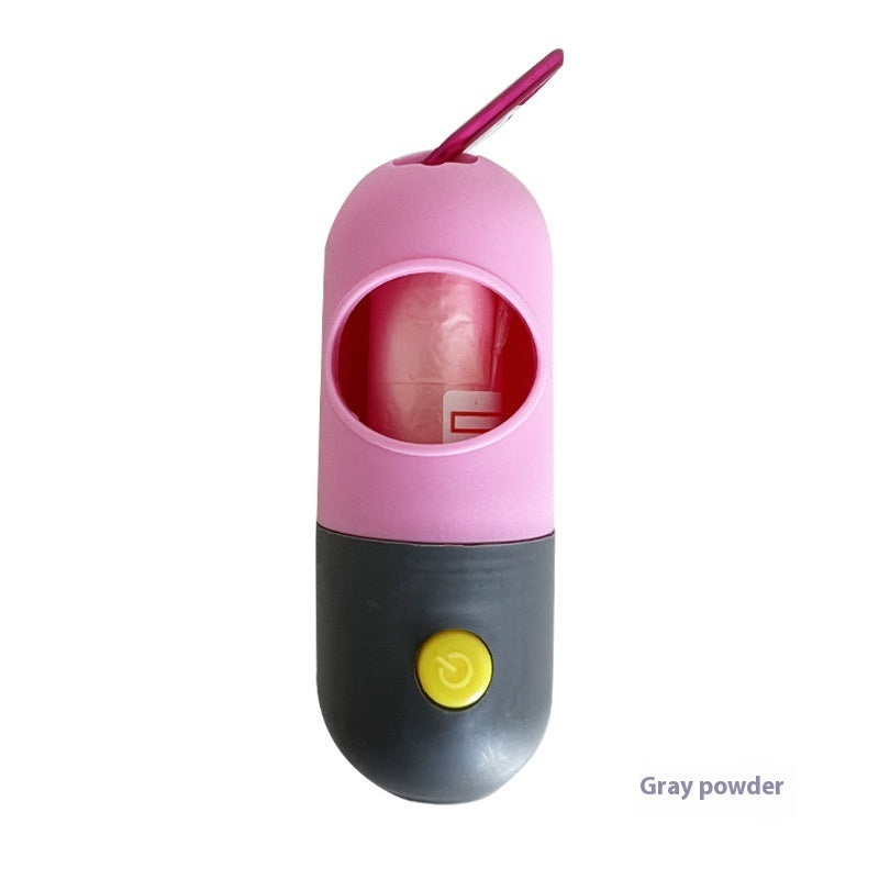 Pink and gray pet waste bag dispenser with a yellow button on a white background