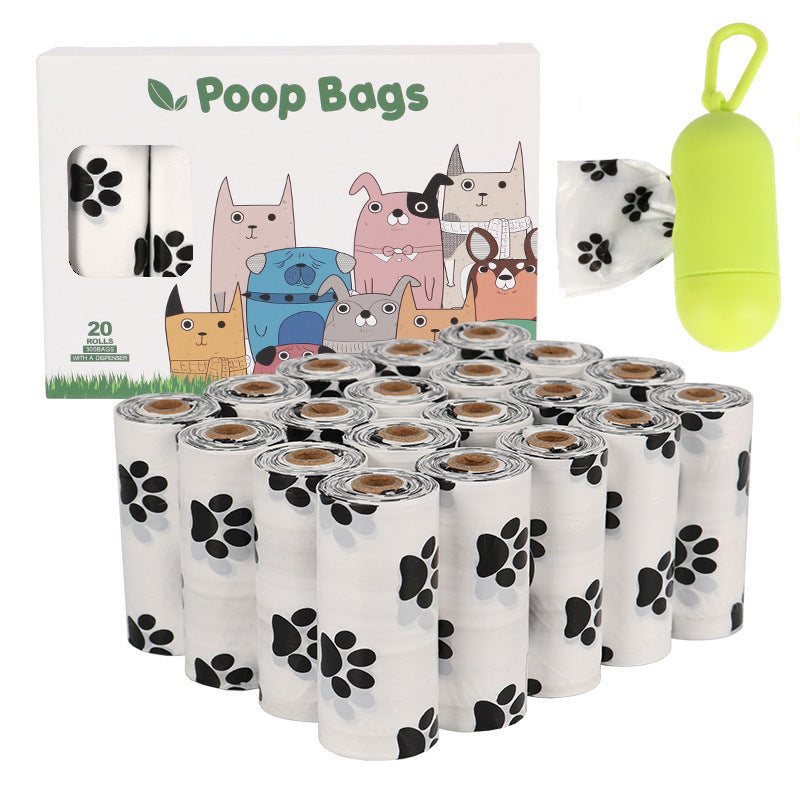 Dog poop bags with packaging and a green bag holder on a white background