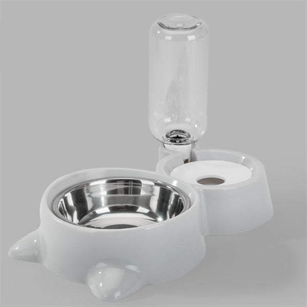 White pet water and food bowl set on a gray background