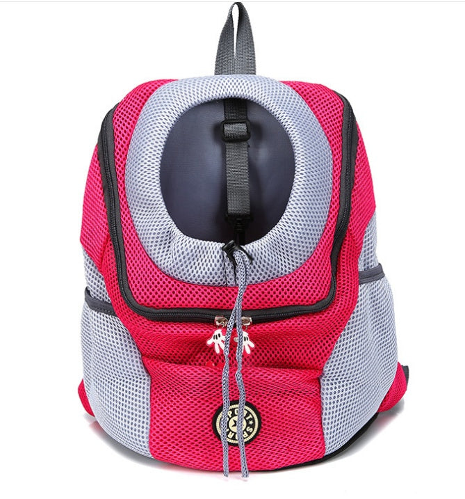 Pink and gray pet carrier backpack on a white background