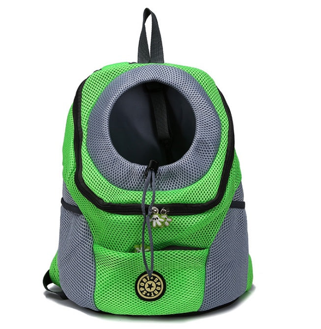 Green and gray pet carrier backpack on a white background