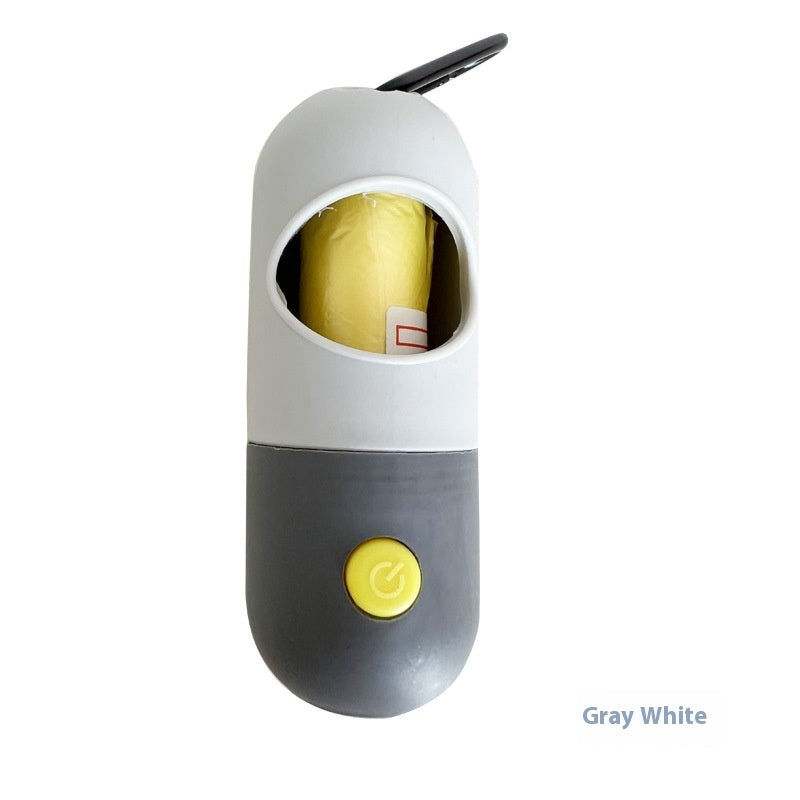 Gray and white pet waste bag dispenser with a yellow button on a white background