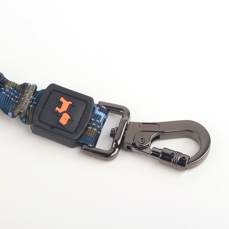Dog collar with blue plaid pattern and metal clasp on a white background