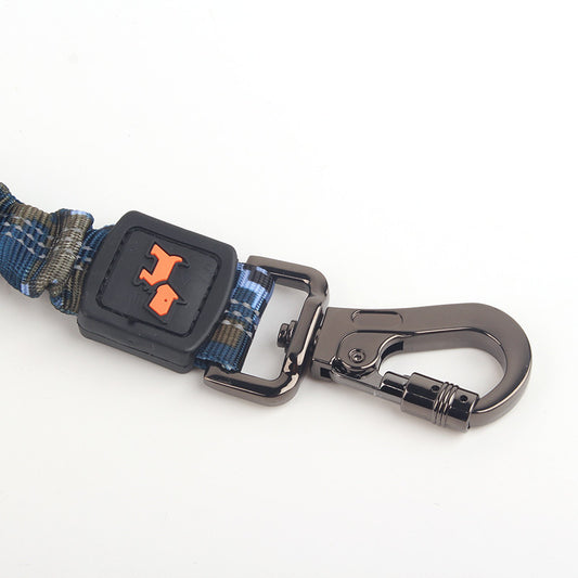 Dog collar with blue plaid pattern and metal clasp on a white background