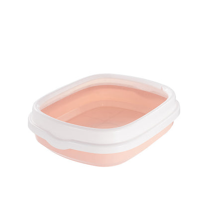Pink pet bowl with white rim on a white background