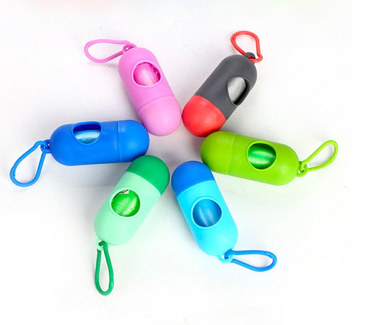 Colorful dog training clickers on a white background