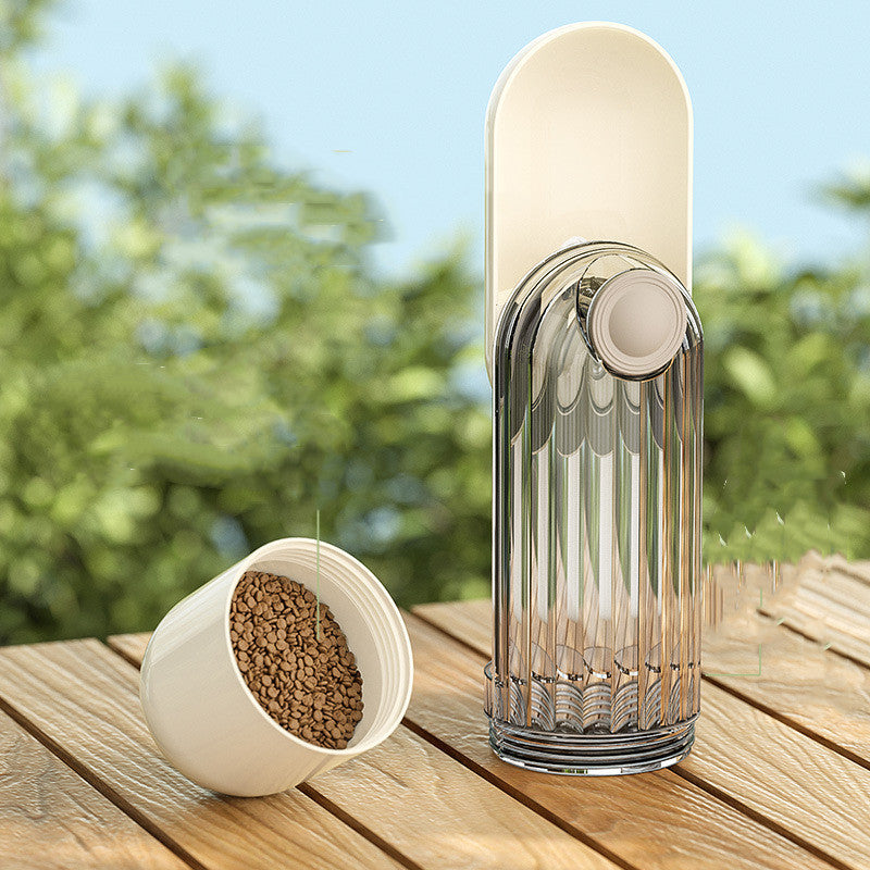 Pet feeder and water bottle set on a wooden surface with a blurred natural background